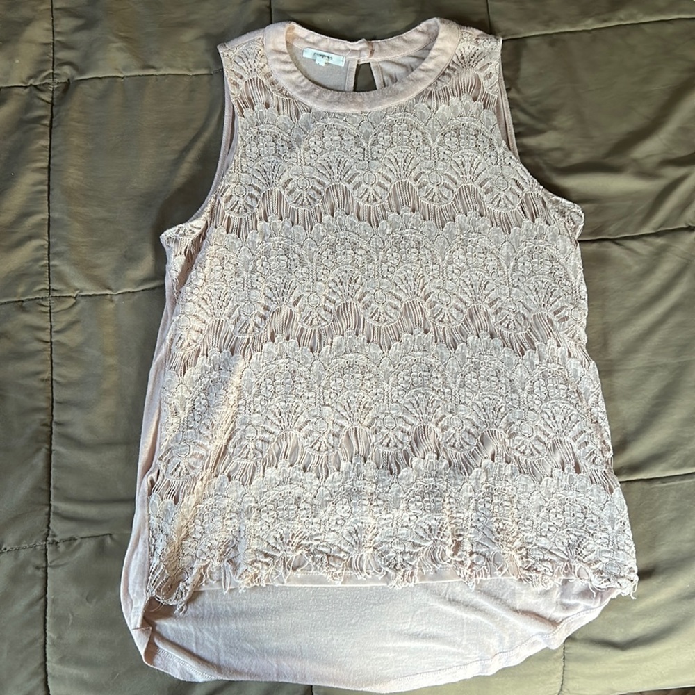 Maurice’s tank top..